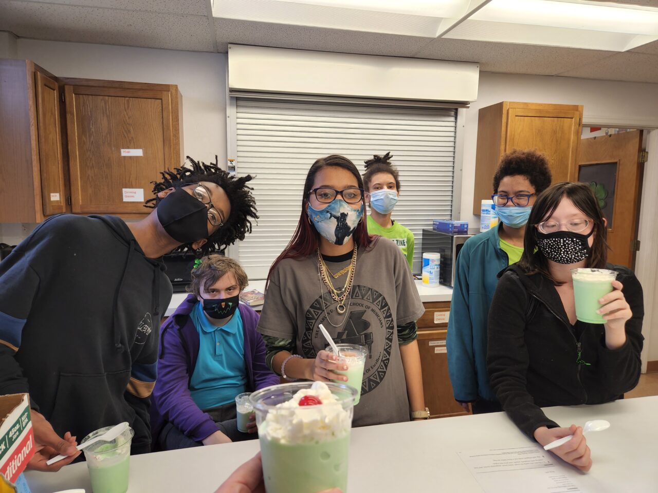Students enjoying a treat together at a classroom celebration